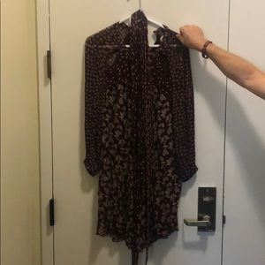 Isabel amaranth Etoile dress with matching belt.